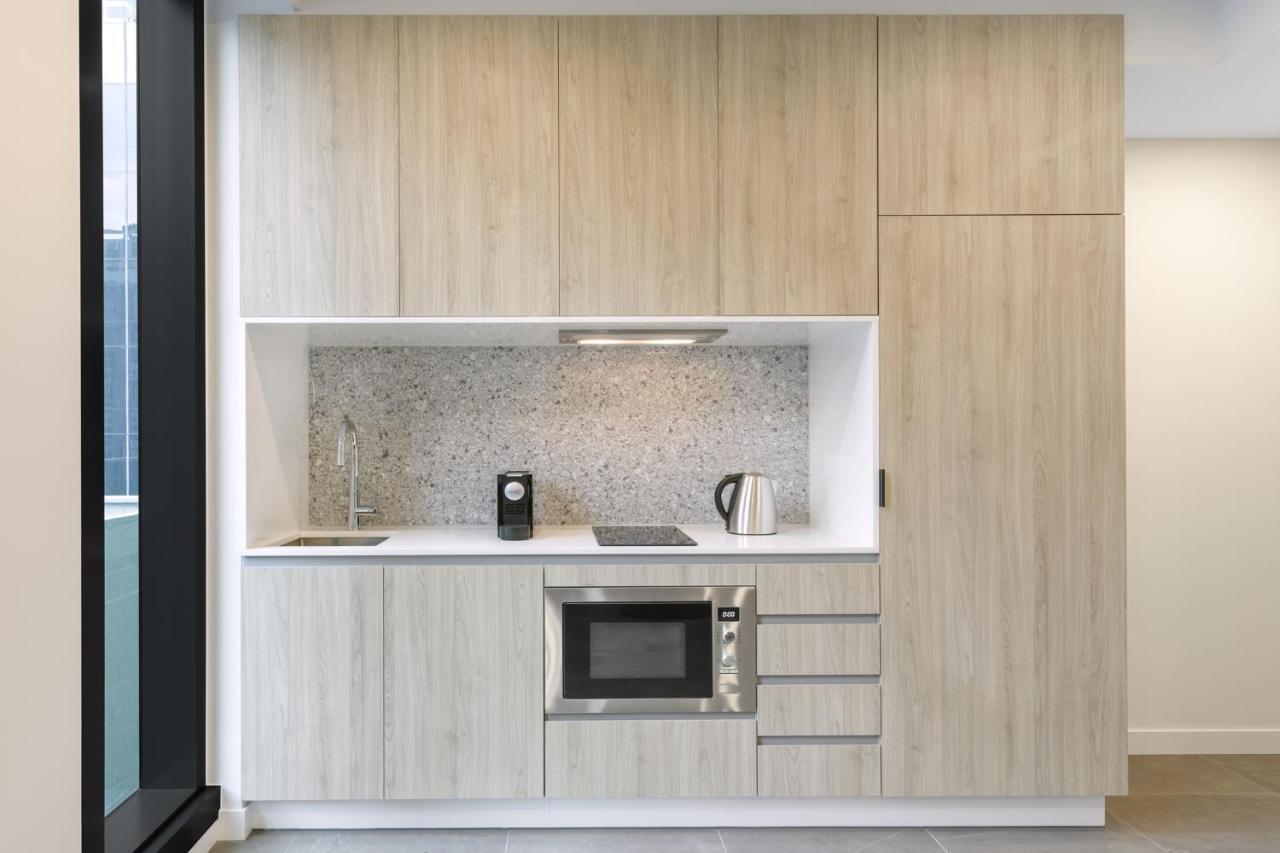 Meriton Suites 멜번 외부 사진 A kitchen in a serviced apartment