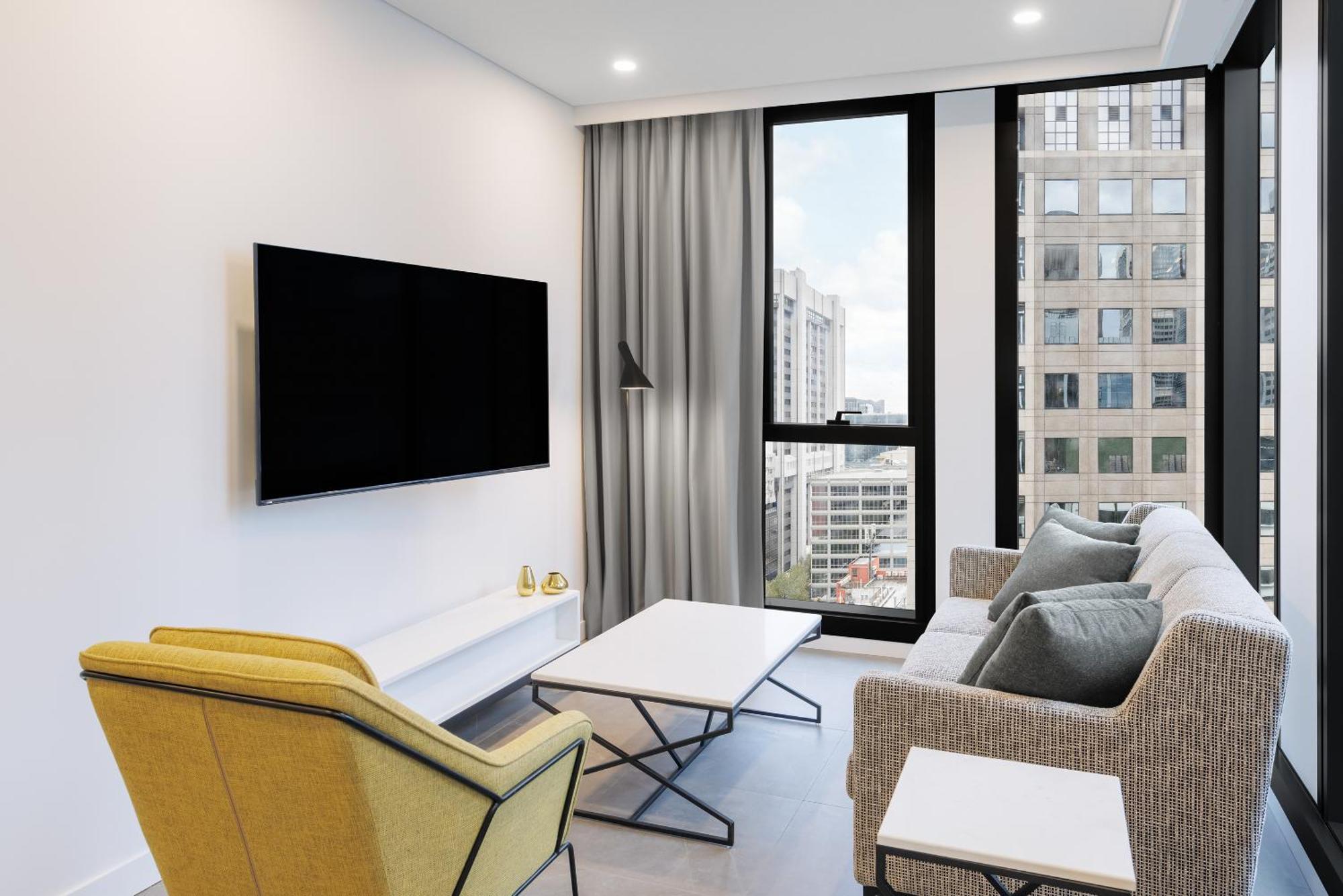 Meriton Suites 멜번 외부 사진 A living room